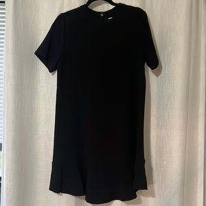 Black dress, ruffle bottom